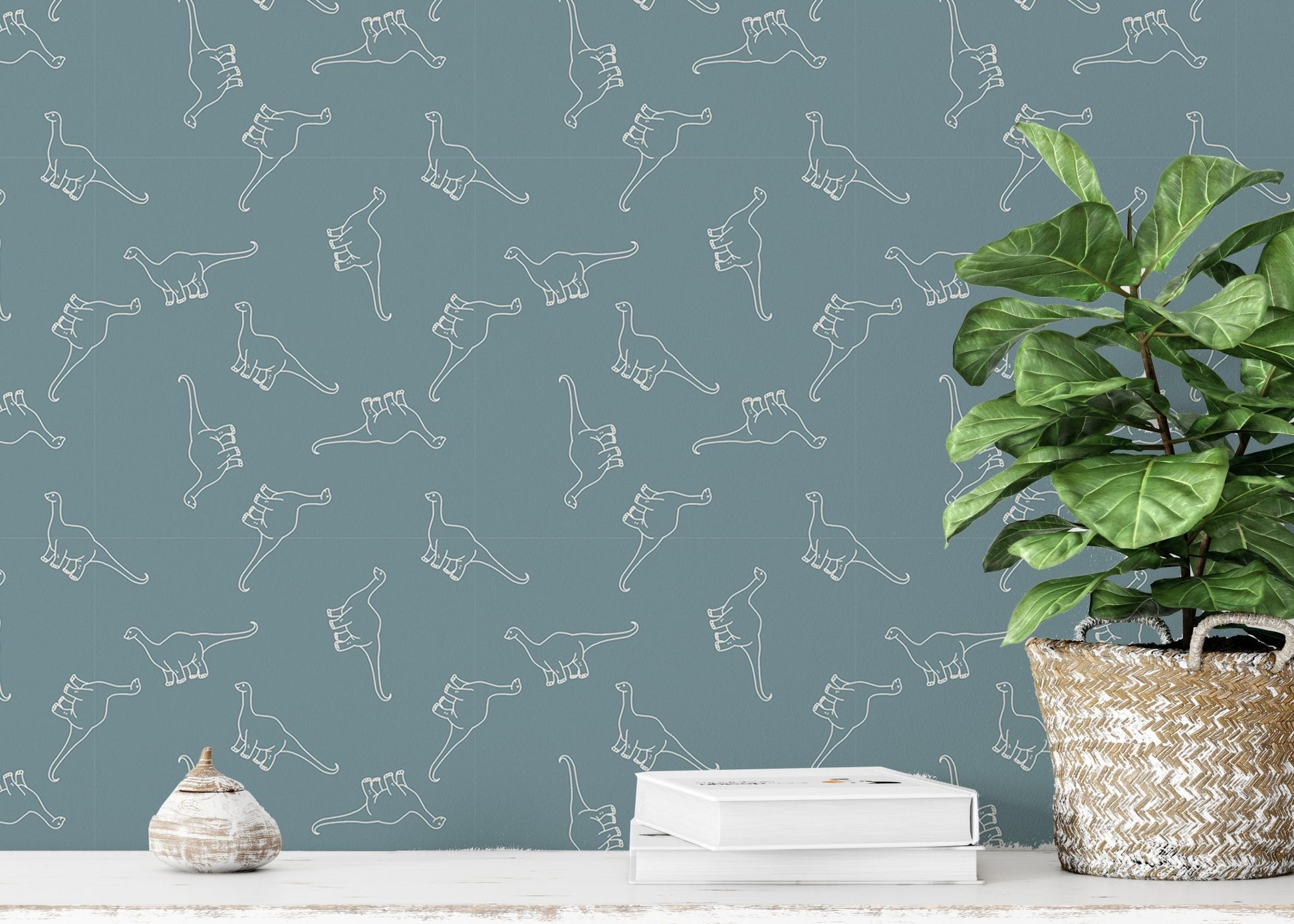Study room wallpaper featuring a teal base with white dinosaur sketches and a green plant.