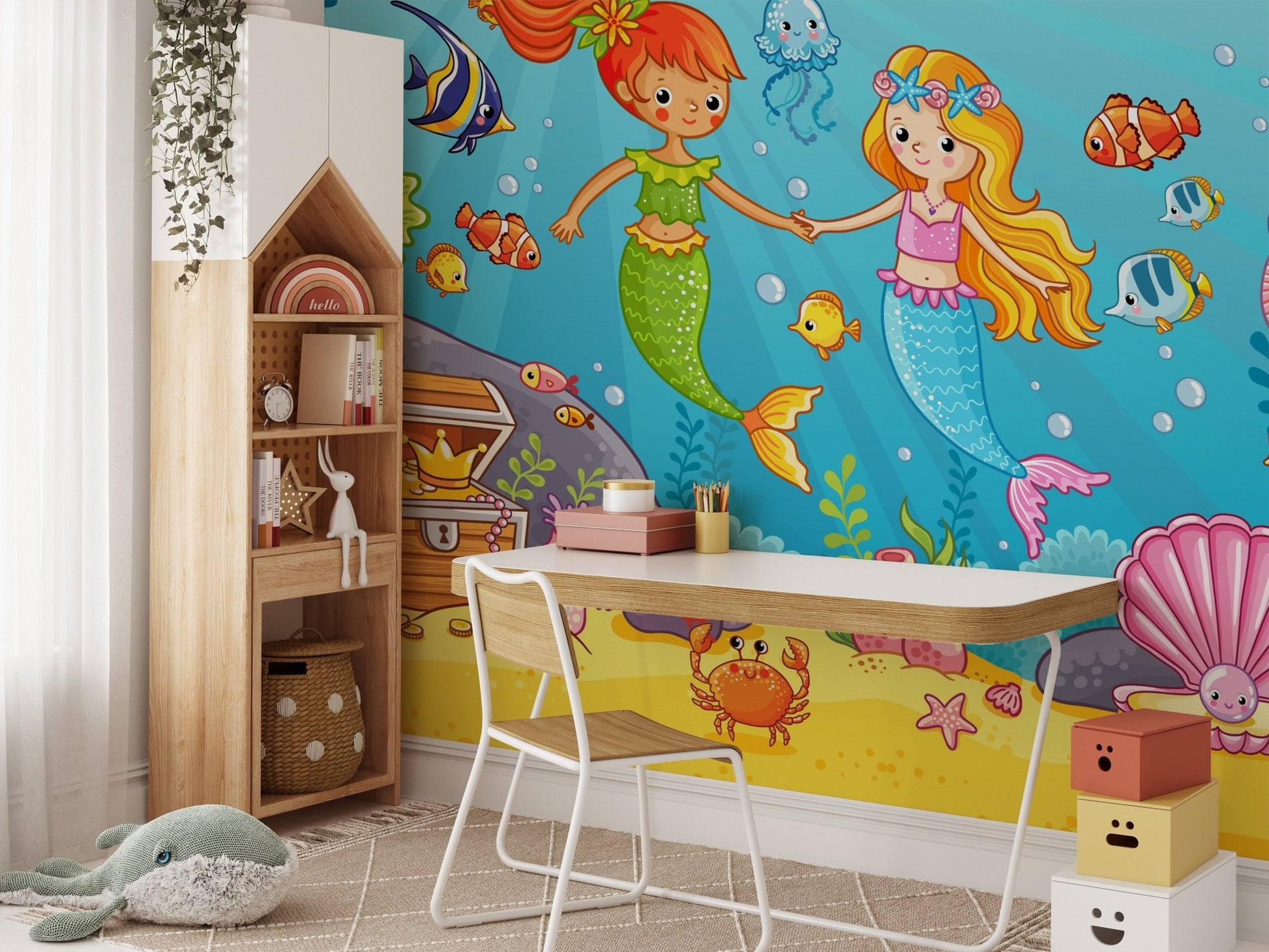 Mermaid best friend wall mural behind a white study desk and wooden chair.