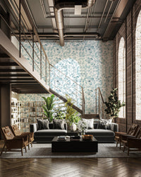 High ceiling loft space with floral bloom wallpaper as backdrop.