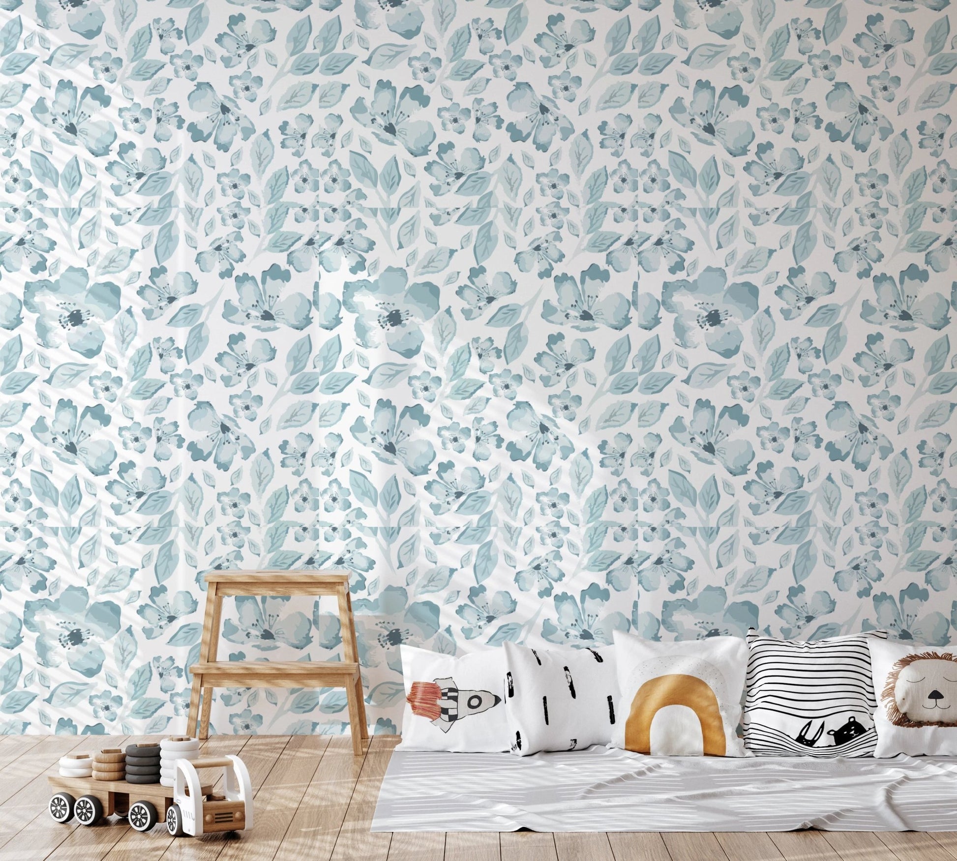 Kids play area with light blue bloom pattern wallpaper.