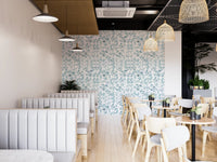 Modern cafeteria with floral bloom pattern wallpaper.