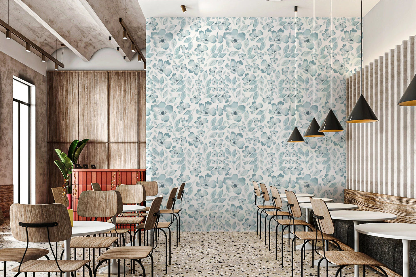 Restaurant dining area featuring aqua floral wallpaper.