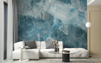 Contemporary living room with blue marble texture wall mural.