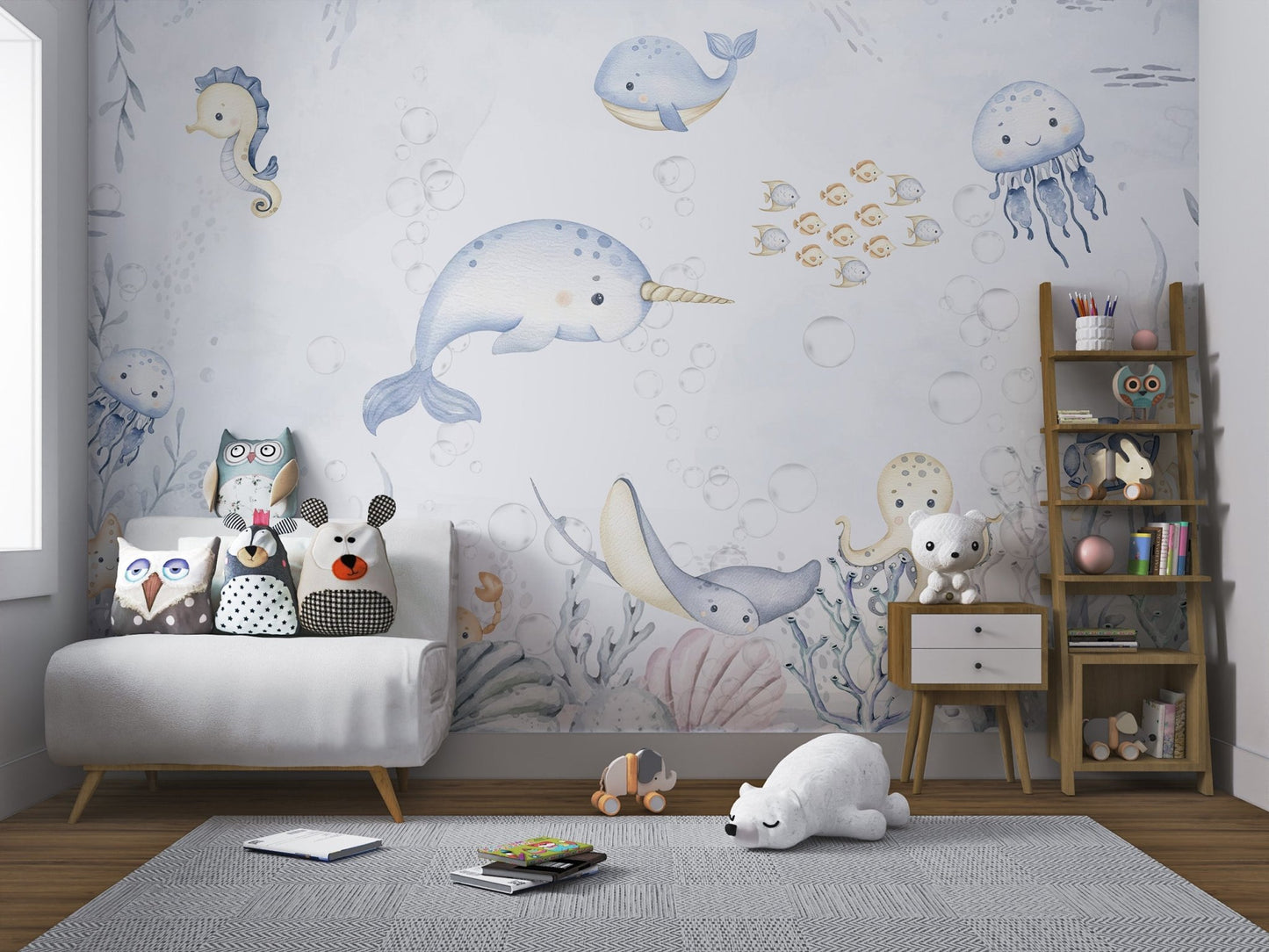 Smiling jellyfish and seahorse mural with aquatic friends in nursery.