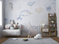 Smiling jellyfish and seahorse mural with aquatic friends in nursery.