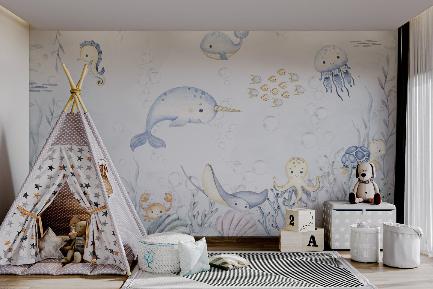 Light blue narwhal with golden horn aquatic animals wall mural in playroom.