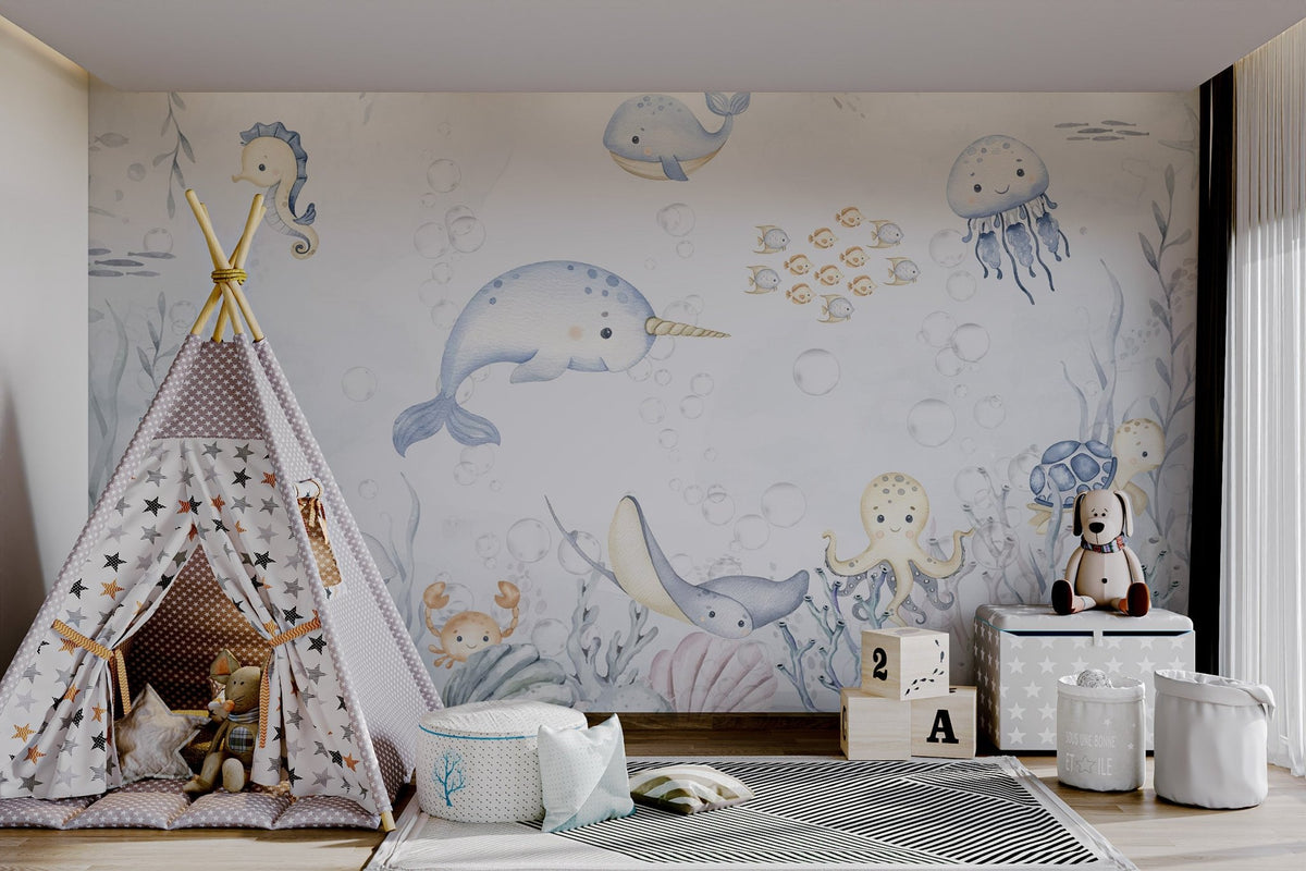 Light blue narwhal with golden horn aquatic animals wall mural in playroom.