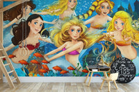Colorful sea fairy tale wallpaper mural behind a child's study desk.