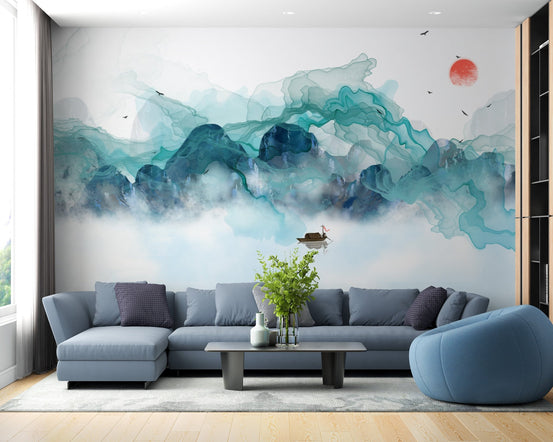 Teal and blue watercolor mountain wall mural in a modern living room.