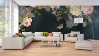 Dark arboreal wall mural in a bright living room with a white sectional sofa.