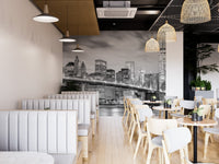 Brooklyn Bridge mural showcasing its architectural marvel for cafe booth interior.
