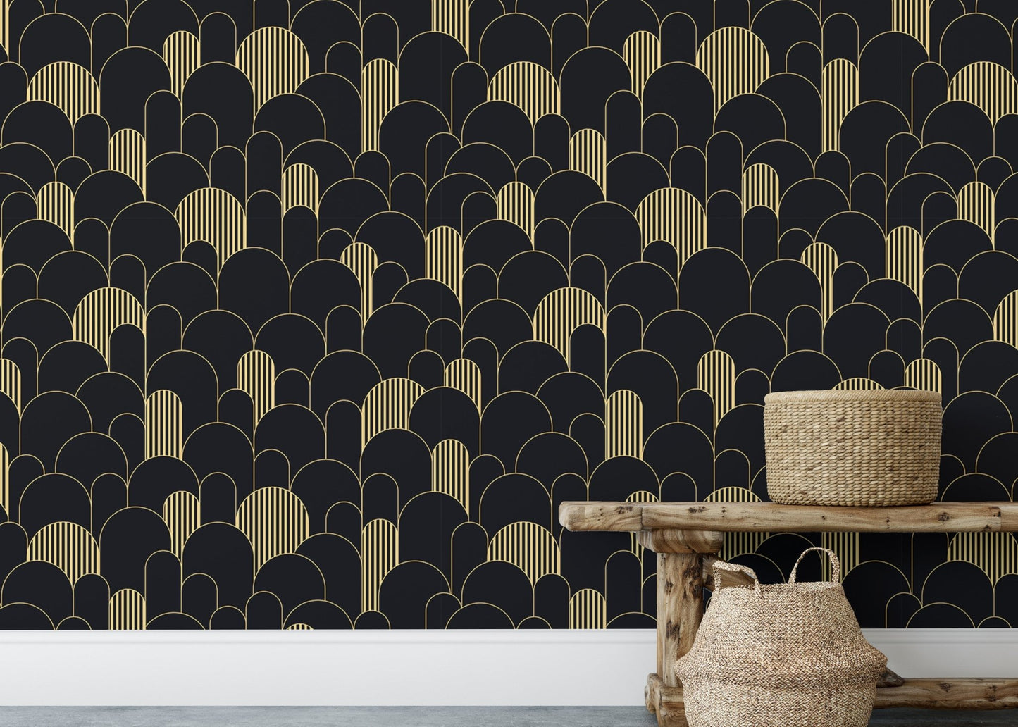 Patterned black wallpaper with gold details behind a rustic wooden bench.