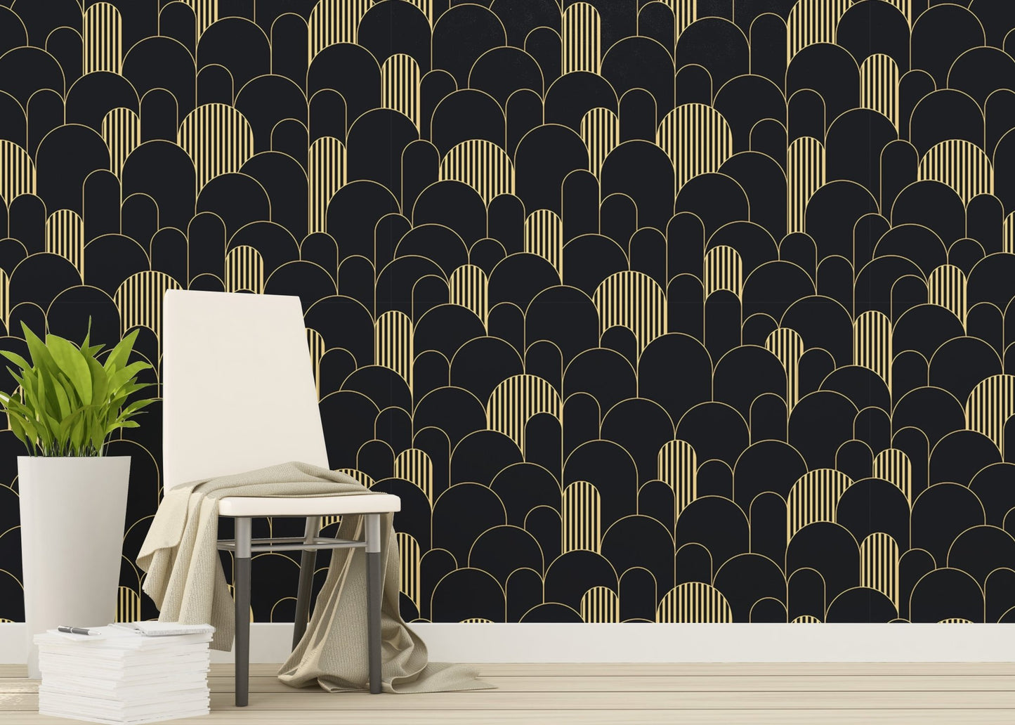 Black and gold Art Deco wallpaper in a living area with a chair and plant.