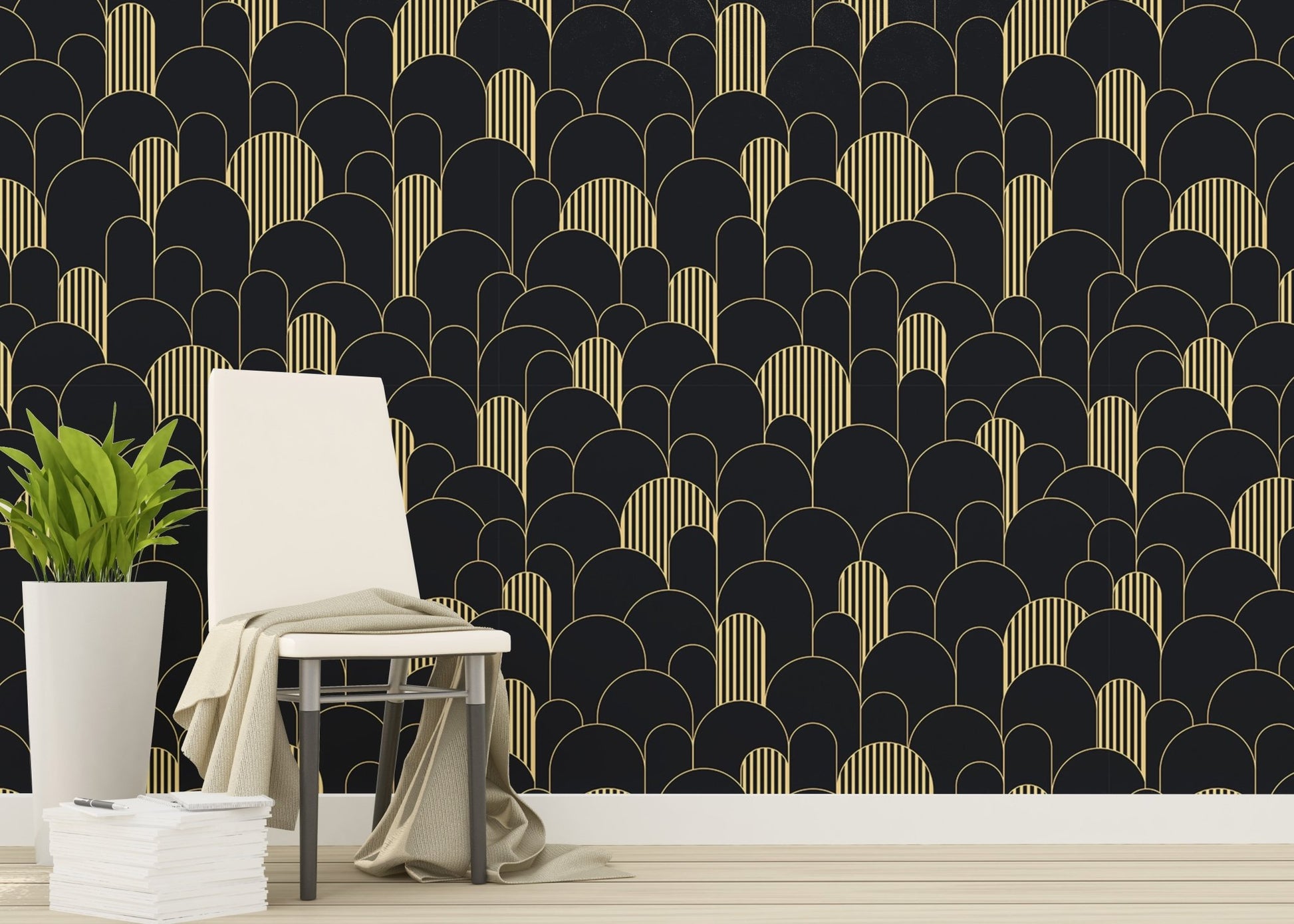 Black and gold Art Deco wallpaper in a living area with a chair and plant.