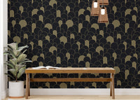 Textured repeat pattern wallpaper behind a long wooden bench and indoor plant.