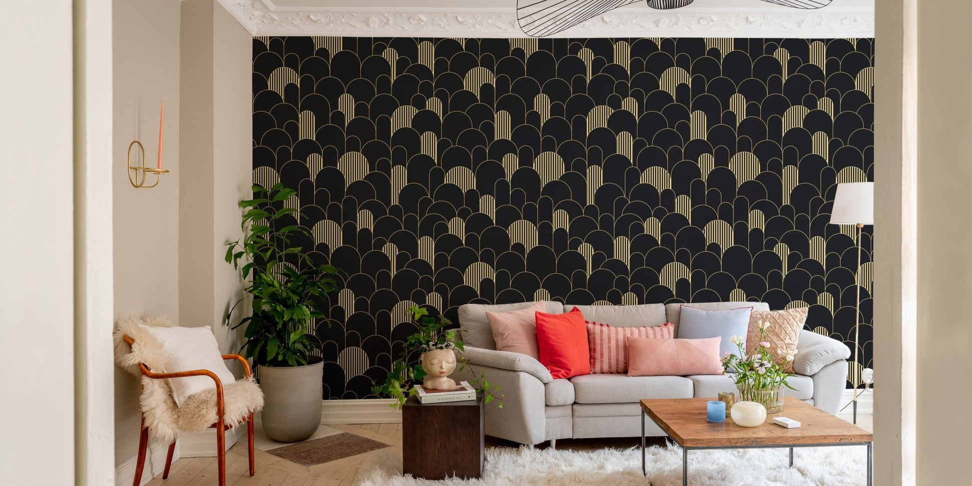 Arched gold line pattern wallpaper in a bright living area with a grey couch.