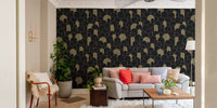 Arched gold line pattern wallpaper in a bright living area with a grey couch.