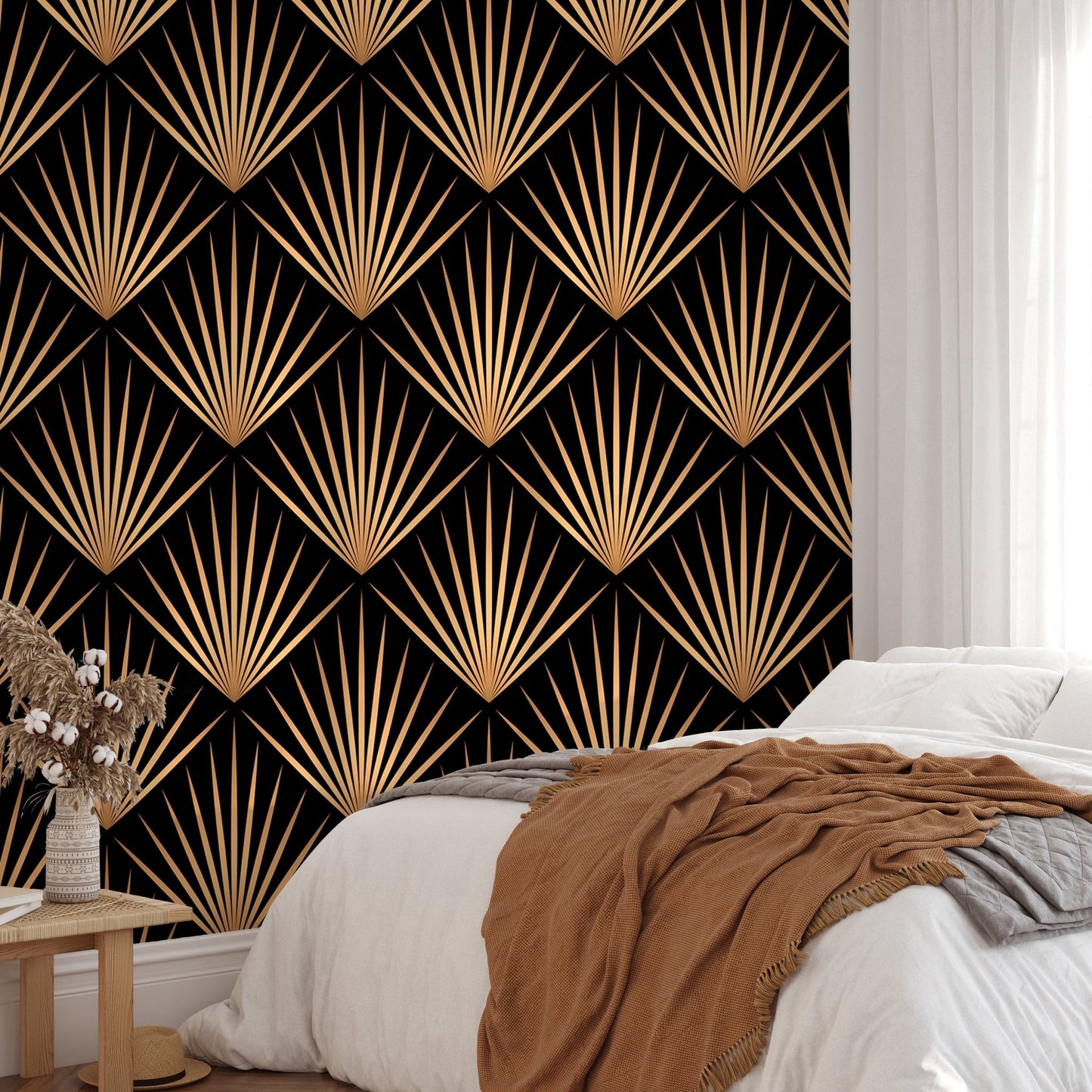 Gold fan pattern wallpaper in a minimalist bedroom with white bed