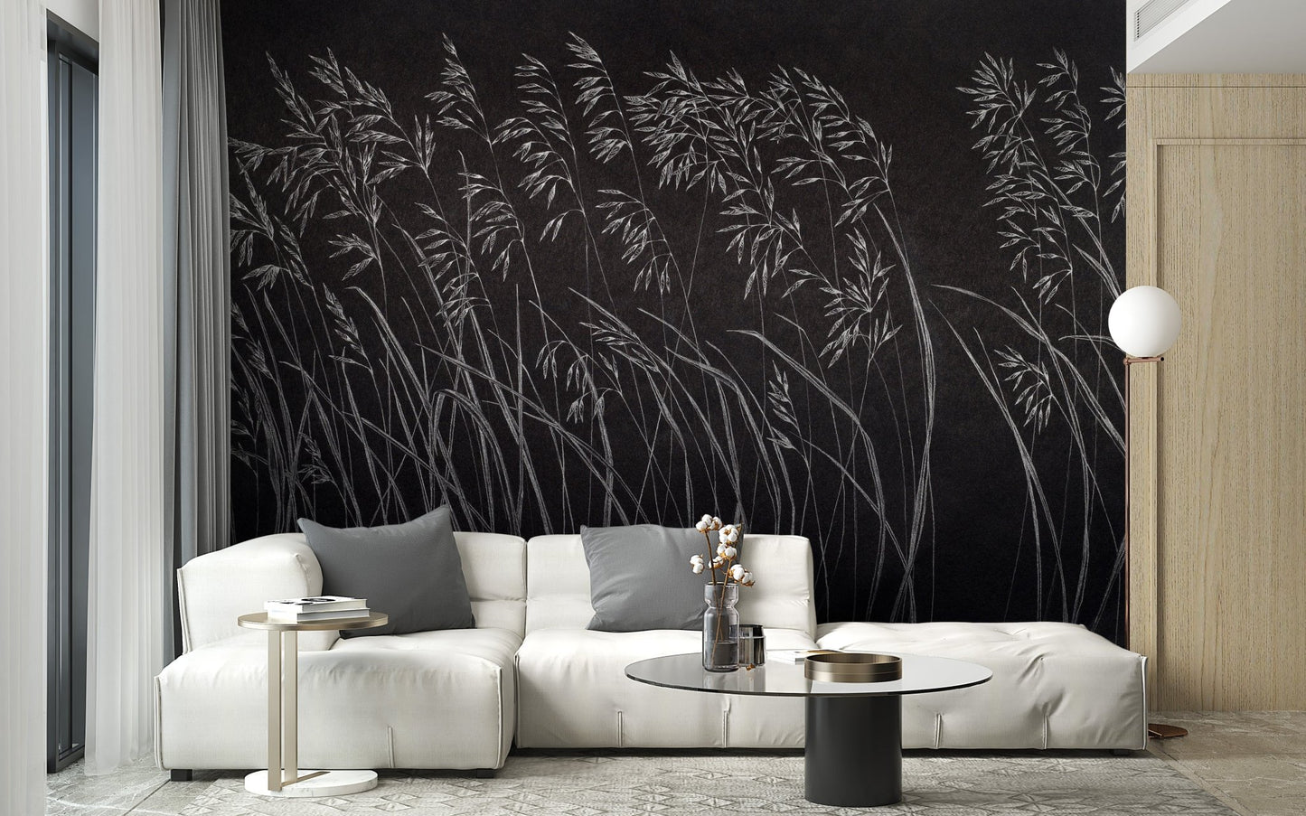Contemporary living area with white seating and dark botanical wall mural.