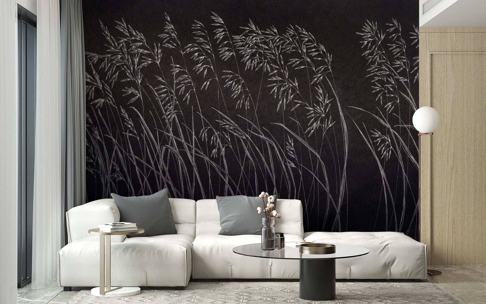 Contemporary living area with white seating and dark botanical wall mural.