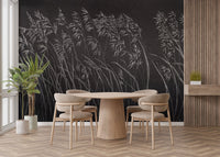 Dining area with Artistic Dark Leaves Wall mural and wooden furniture.