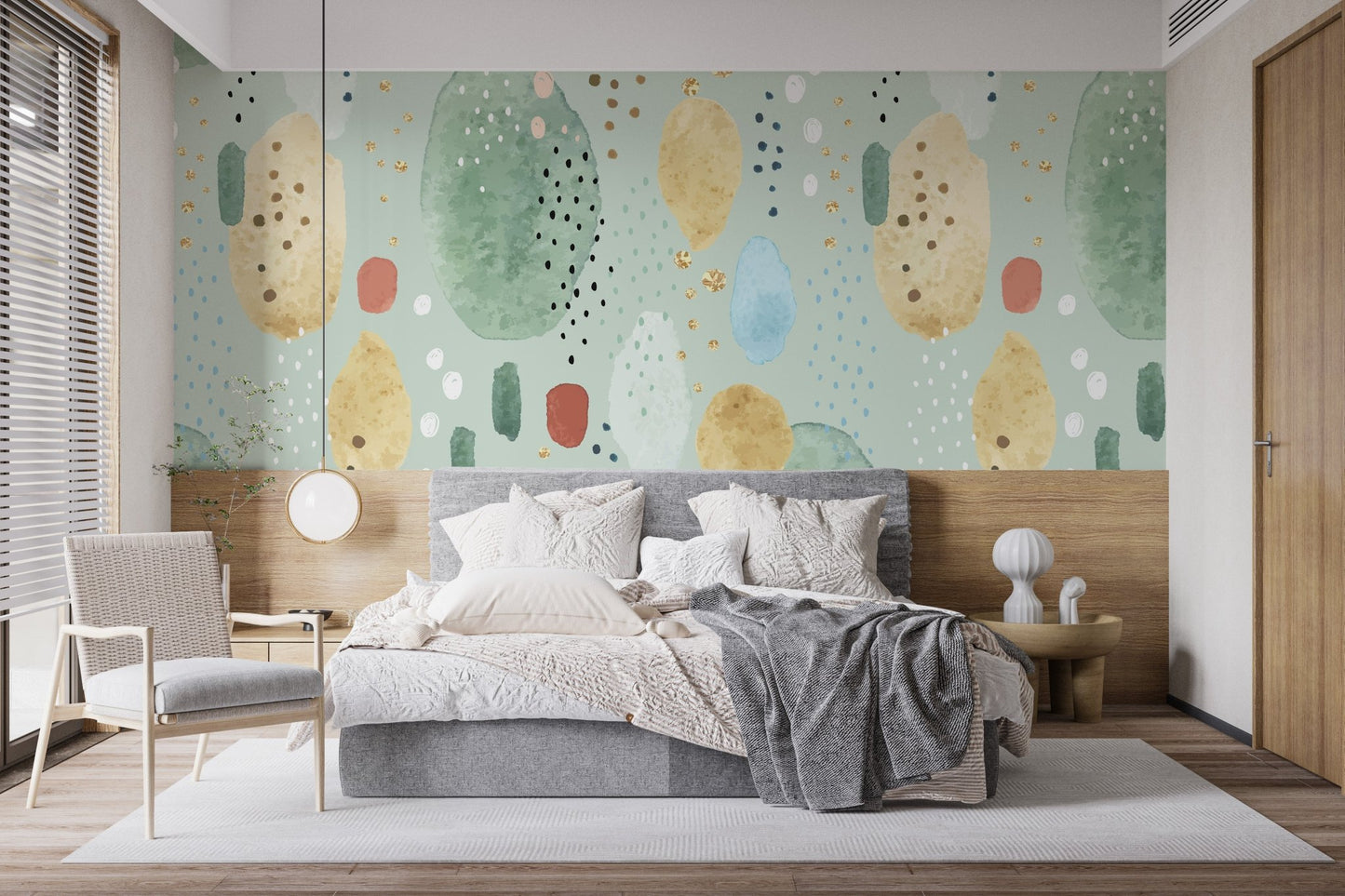 Guest room featuring a nature-inspired green patterned wall mural.