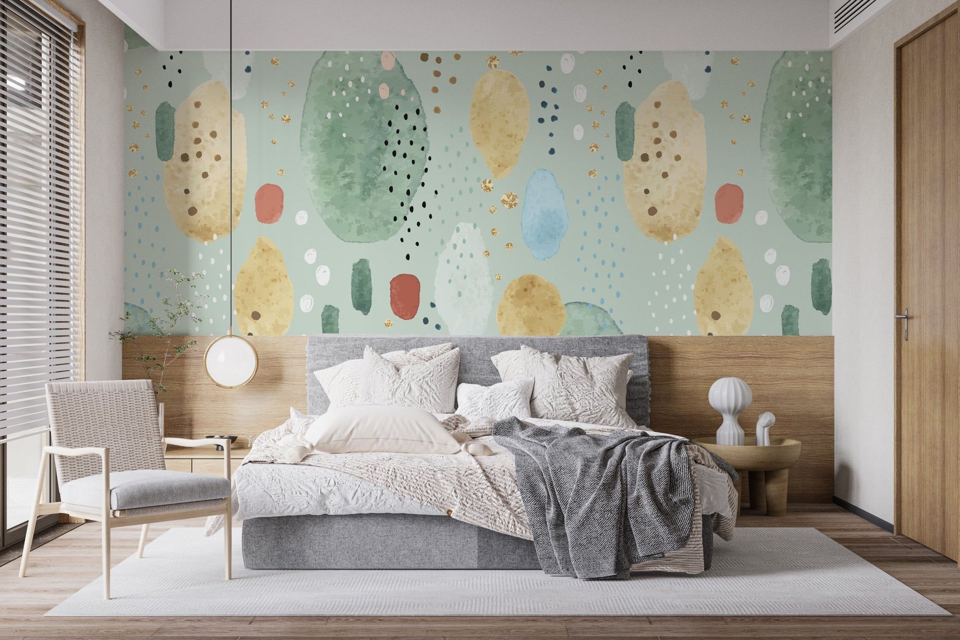 Guest room featuring a nature-inspired green patterned wall mural.