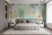 Large bedroom wall mural with soft green and earth tone shapes.