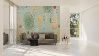 Spacious living area with a decorative green abstract wall mural.