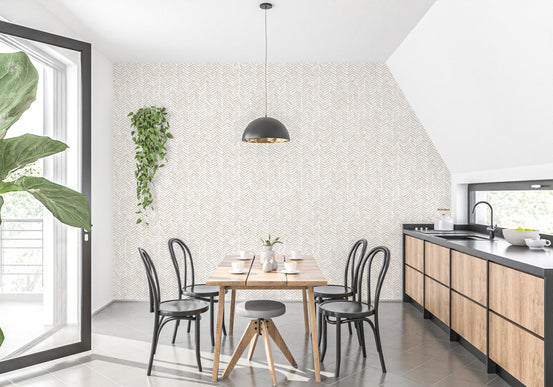 Modern dining room wallpaper with a herringbone pattern and black chairs.