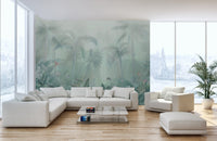 Artistic Lush Green Forest Wall Mural behind a modern white sectional couch in living room.