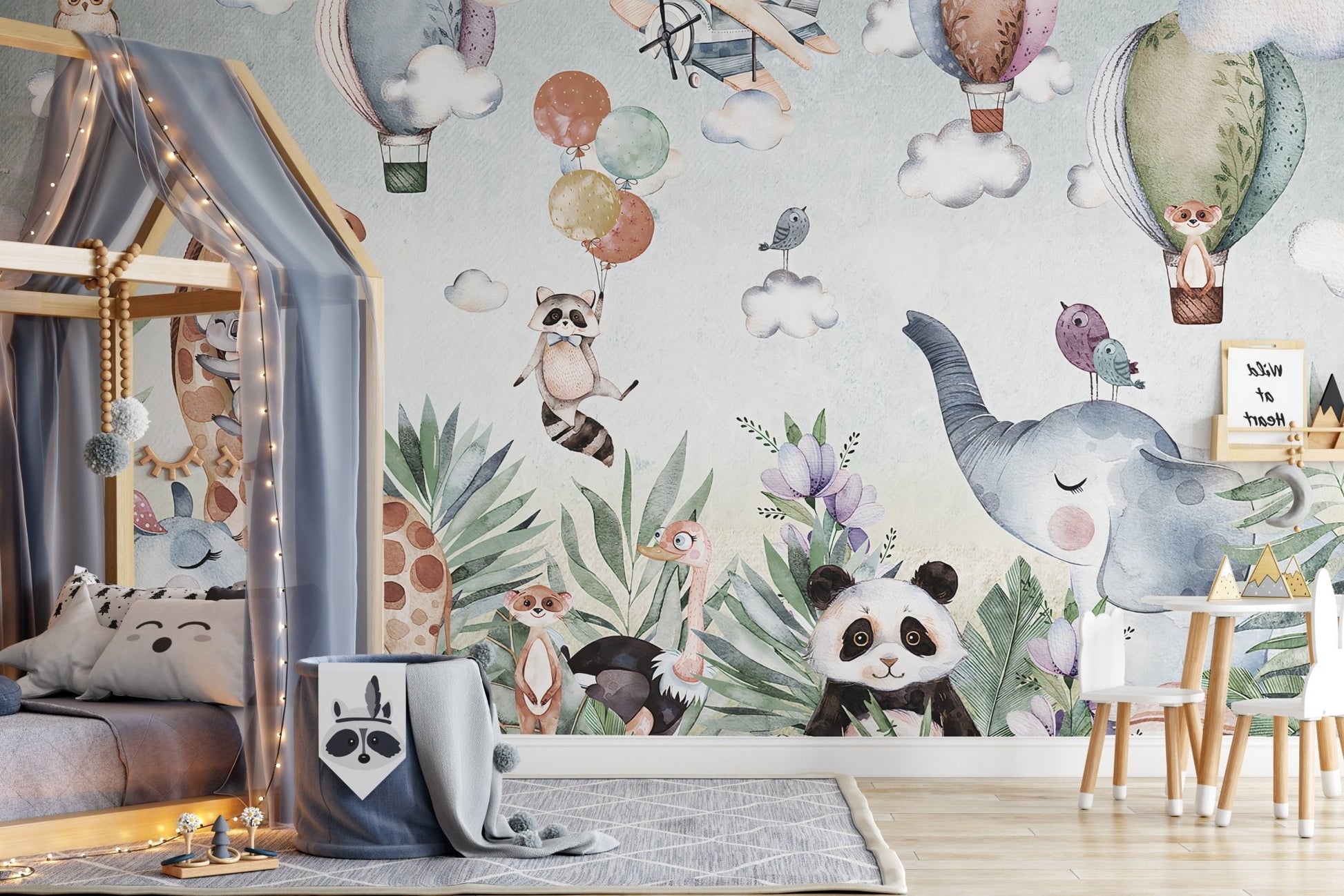 Kids bed with Artistic Textured Wildlife Wall Art Murals in light blue.