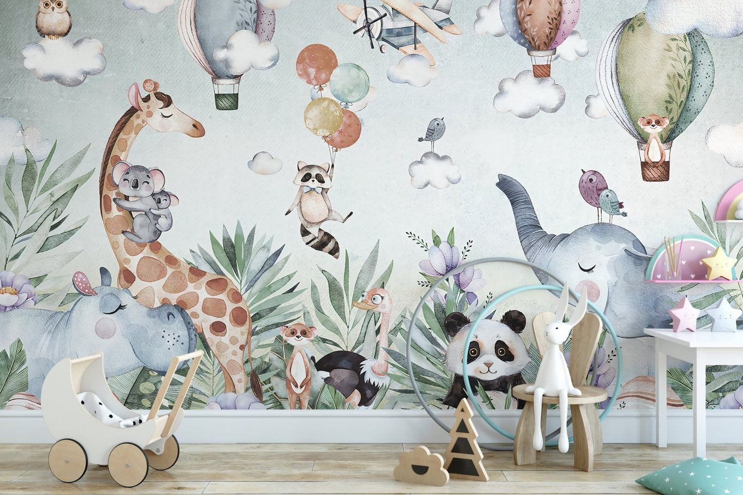 Animal art wall mural with giraffe and panda in a children playroom setting.
