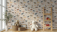 Repeating dog wallpaper with small and large breeds in beige color.