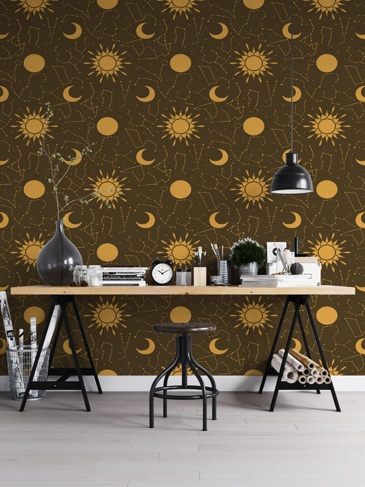 Deep brown design wallpaper mural featuring intricate golden zodiac star charts.