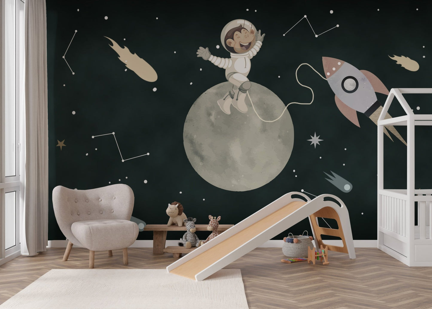 Cartoon monkey astronaut on a cratered moon wall mural for nursery.