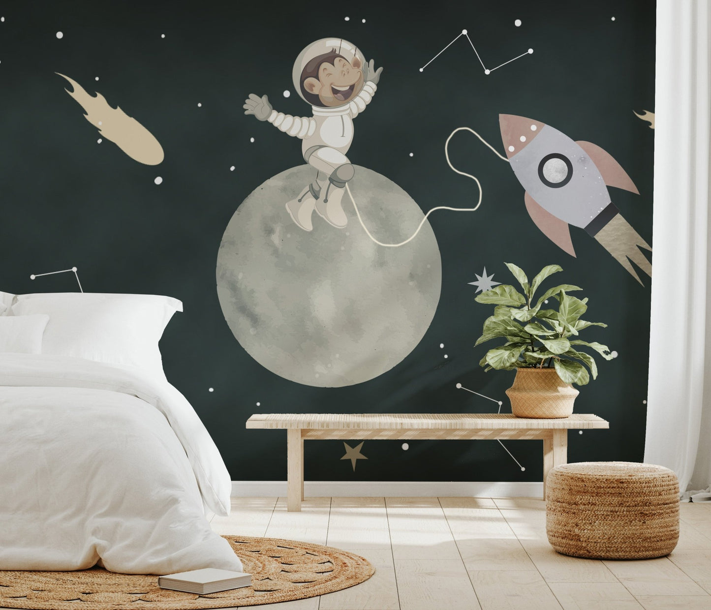 Playful wall mural of a monkey in a spacesuit next to a rocket in space.