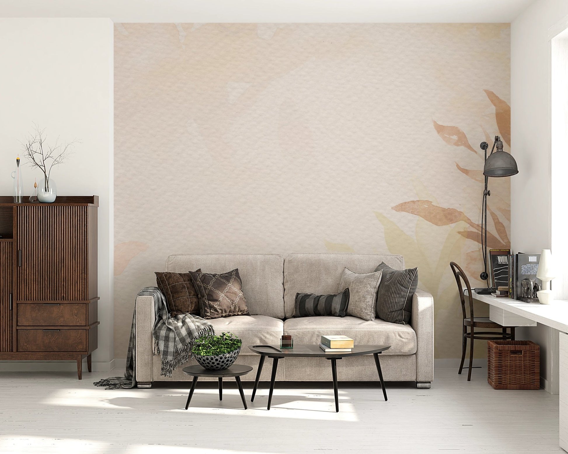 Neutral living space with a large botanical foliage wall mural and a dark wood cabinet.