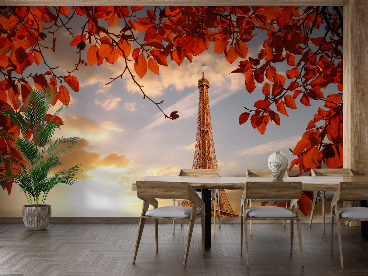 Paris landscape wall mural in a dining room with wooden chairs.
