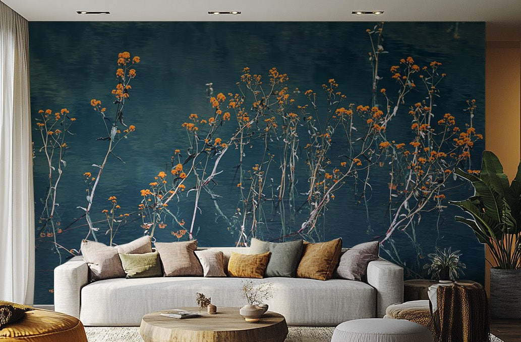 Autumn whispers wallpaper mural with orange flowers on blue water.