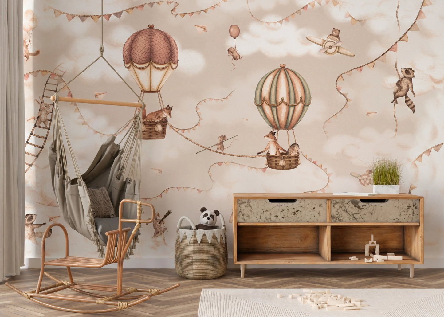 Minimalist nursery with a rocking chair and neutral aviation wall mural