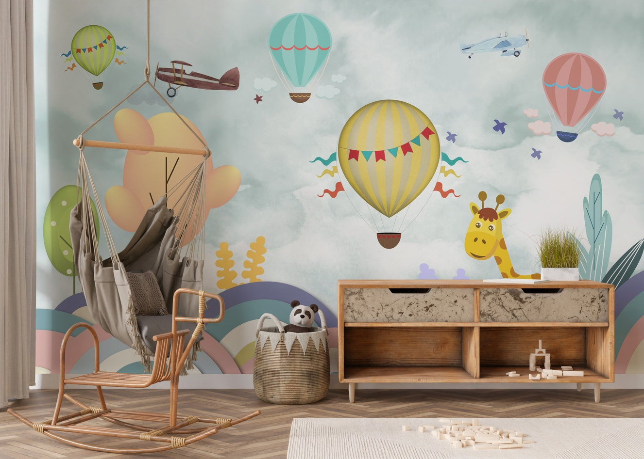 Balloon & Multicolor Cartoon Wall mural in a playroom with a wooden hanging chair.