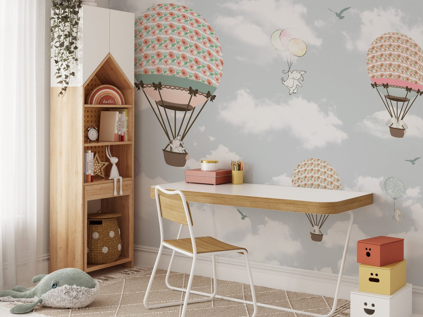 Study corner for kids featuring a wall mural with whimsical flying balloons wonderland.