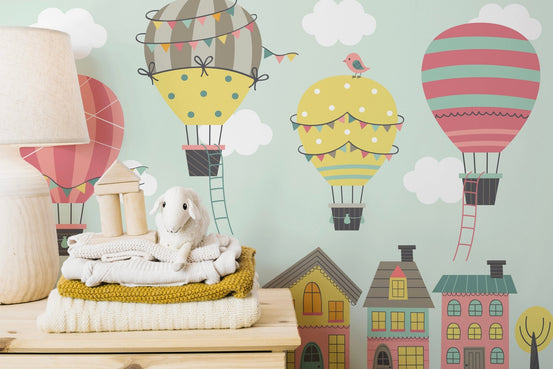 Whimsical balloon mural for imaginative nursery wall decor.
