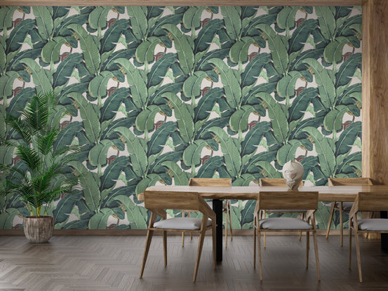 Green botanical wallpaper for walls in a dining area with wooden table
