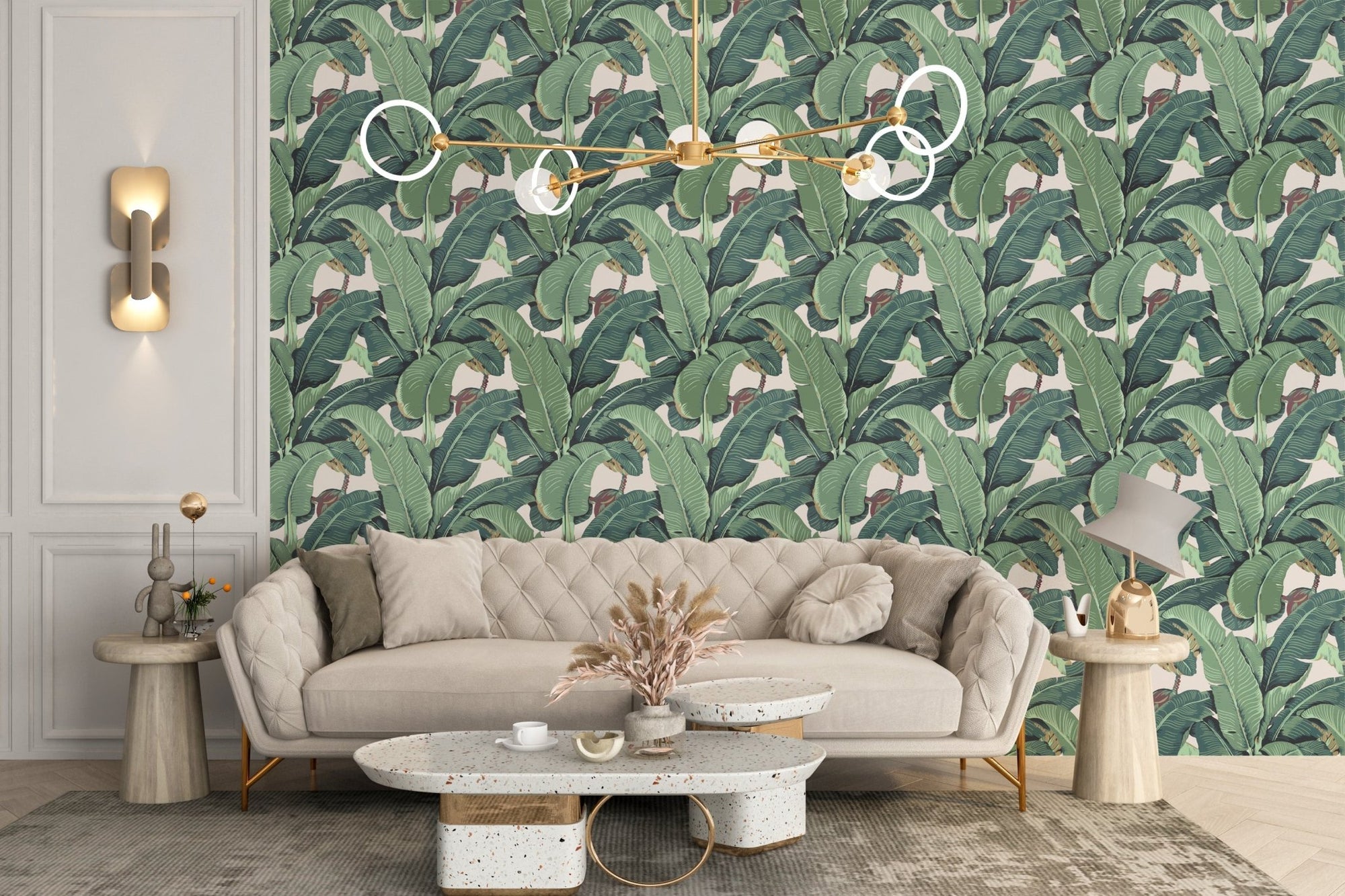 Banana leaf pattern wallpaper in a beige living room with soft modern seating