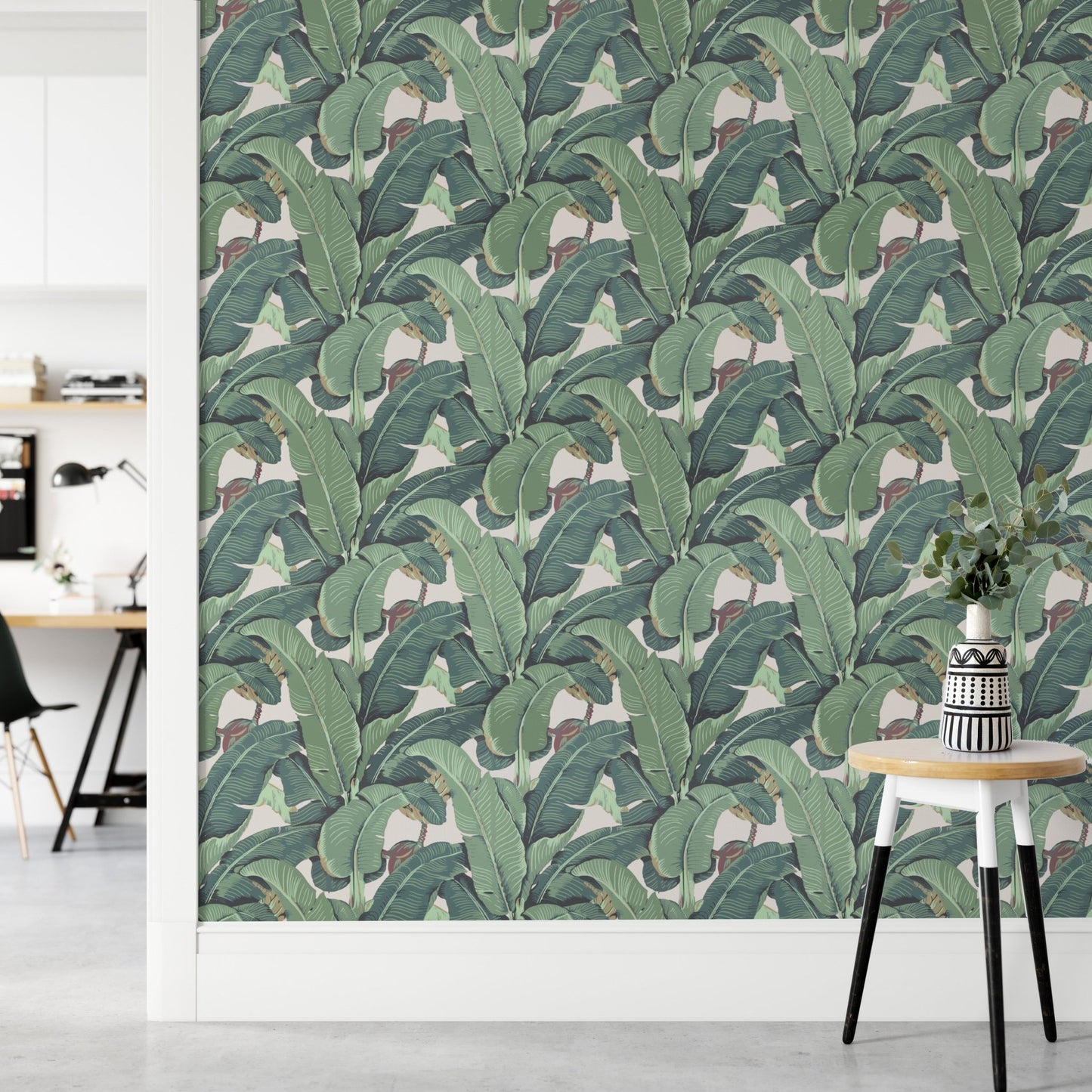 Modern office space featuring Banana Leaf Tropical Wall mural and white desk.