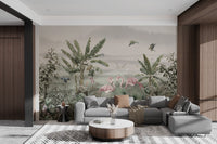 Tropical mural with flamingos and palm leaves in modern lounge.