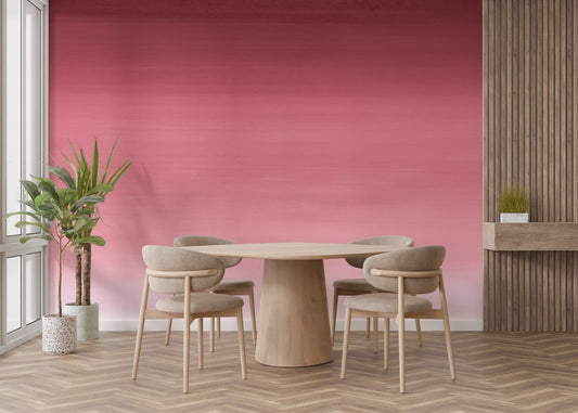 Minimalist pink ombre wall mural with a soft textured finish.