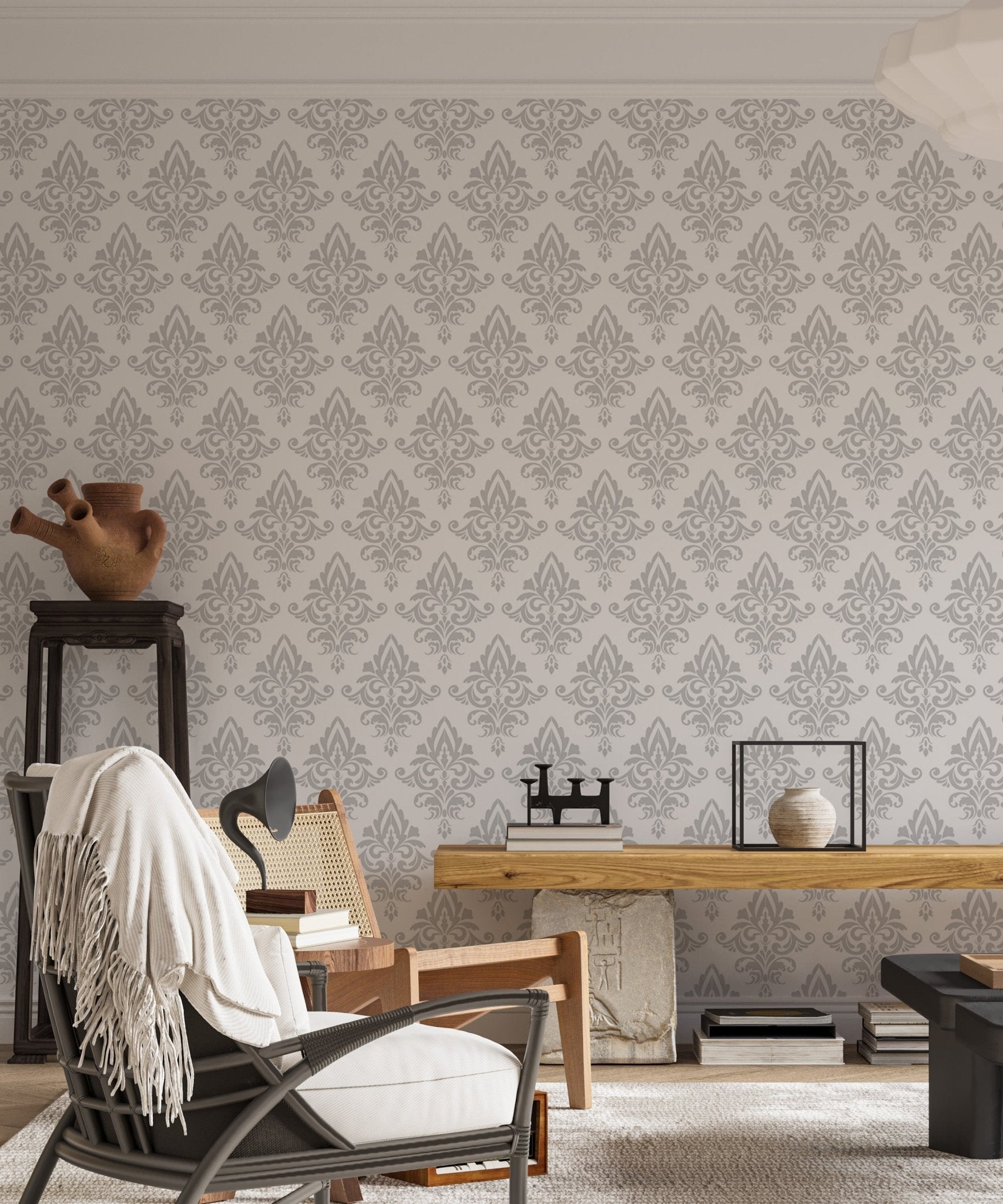 Ornate style wallpaper pattern in a workspace with a wooden desk and chair.
